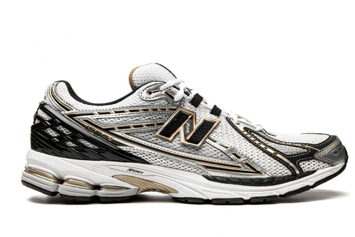 New Balance 1906R Uomo   Scarpe da ginnastica "Bianco/Oro".